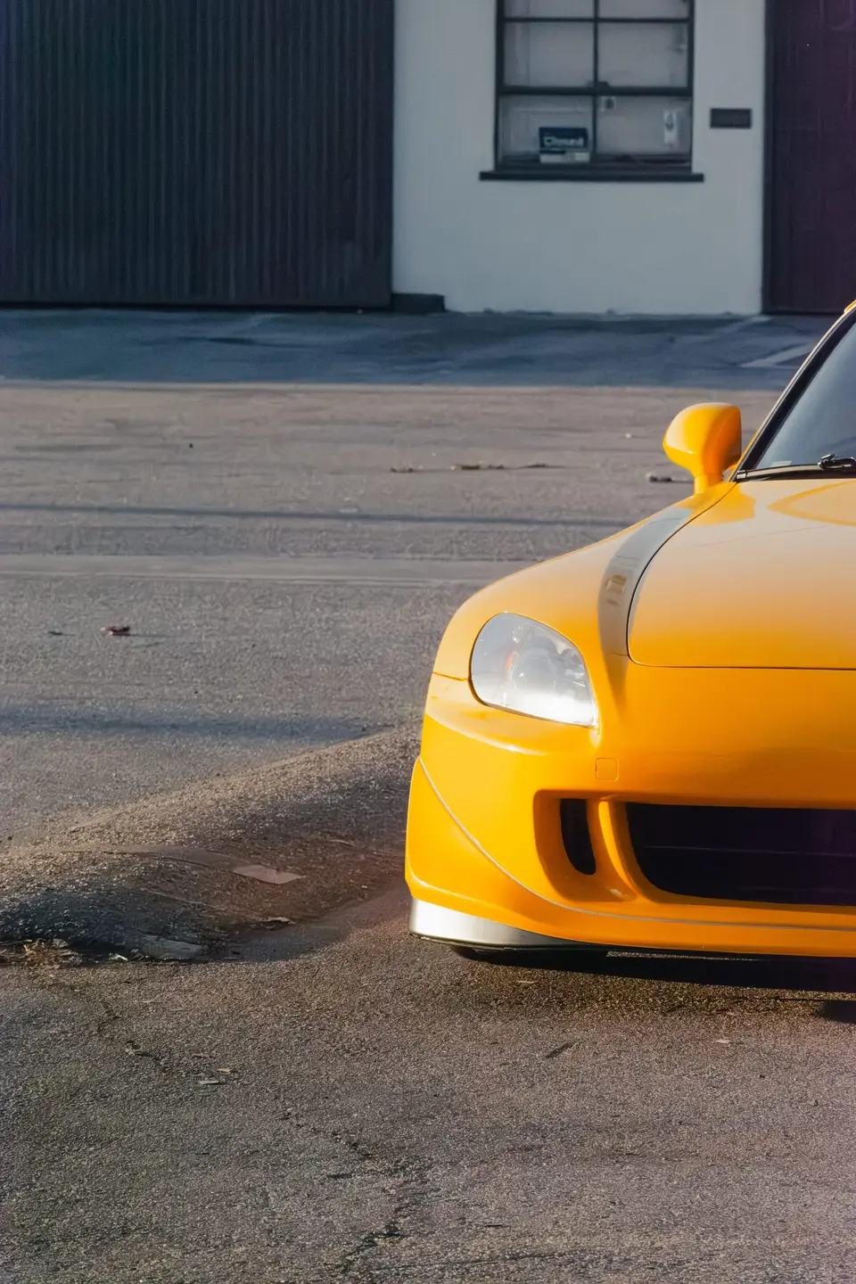 Yellow Honda S2000 paint correction and ceramic coating — studio photo 78