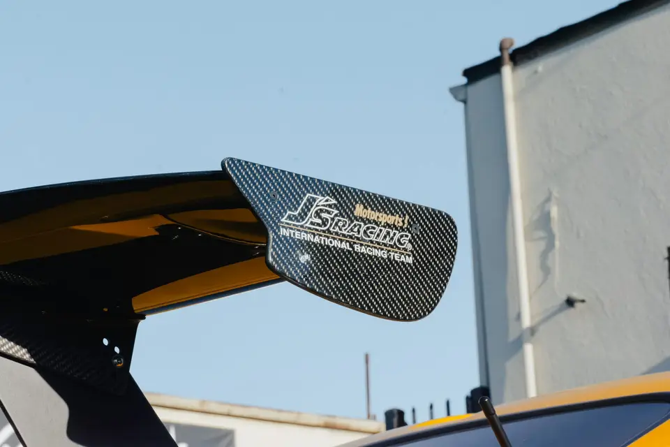 Yellow Honda S2000 paint correction and ceramic coating — studio photo 84