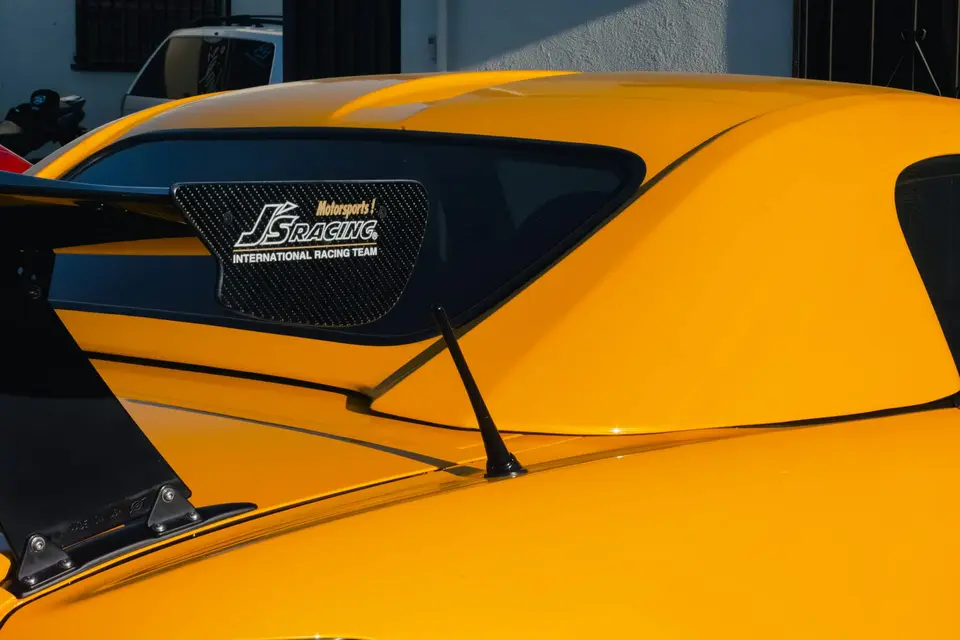 Yellow Honda S2000 paint correction and ceramic coating — studio photo 86