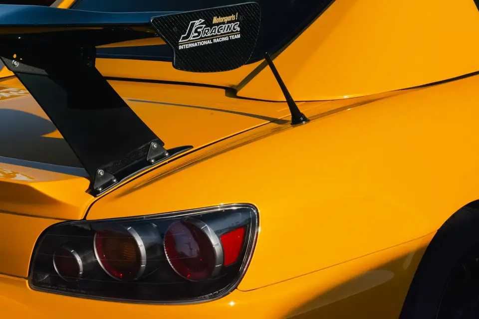 Yellow Honda S2000 paint correction and ceramic coating — studio photo 88