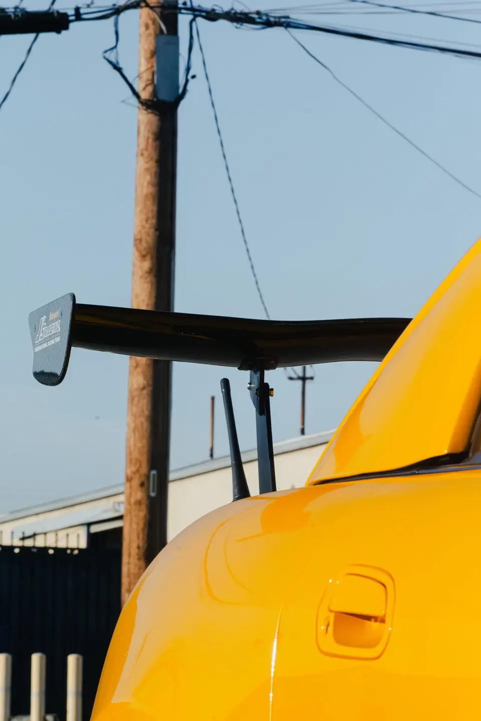 Yellow Honda S2000 paint correction and ceramic coating — studio photo 90