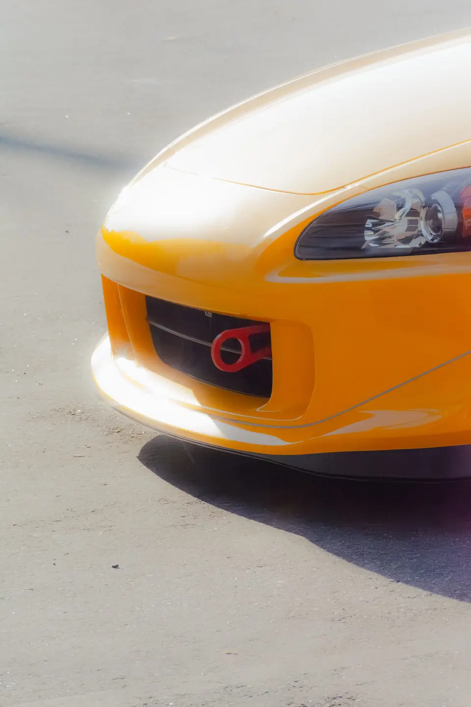 Yellow Honda S2000 paint correction and ceramic coating — studio photo 79