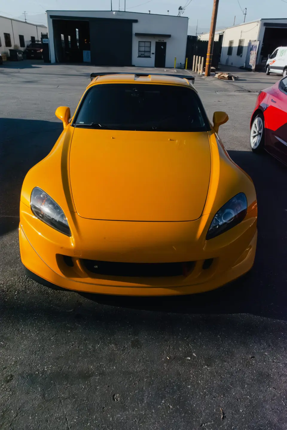 Yellow Honda S2000 paint correction and ceramic coating — studio photo 97