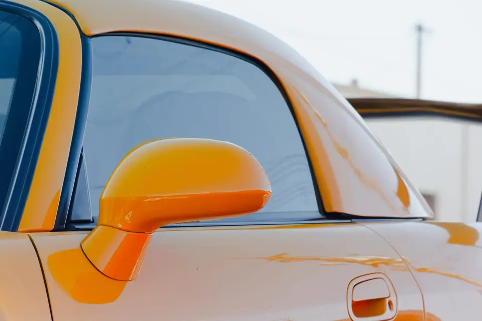 Yellow Honda S2000 paint correction and ceramic coating — studio photo 99