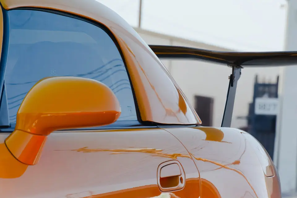 Yellow Honda S2000 paint correction and ceramic coating — studio photo 101