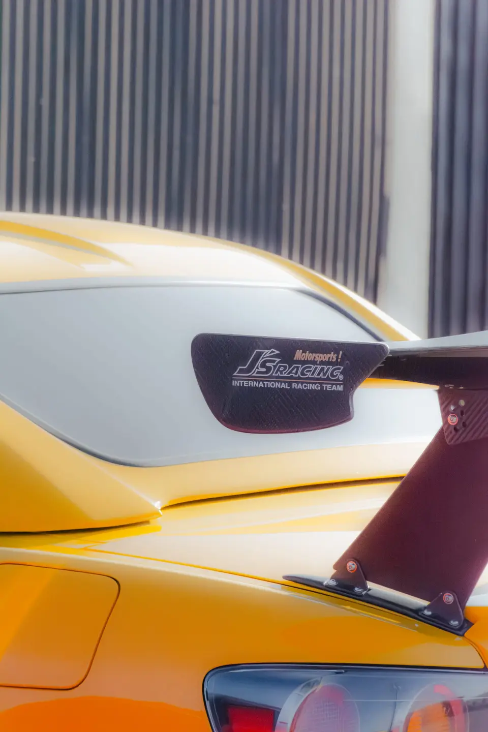 Yellow Honda S2000 paint correction and ceramic coating — studio photo 83