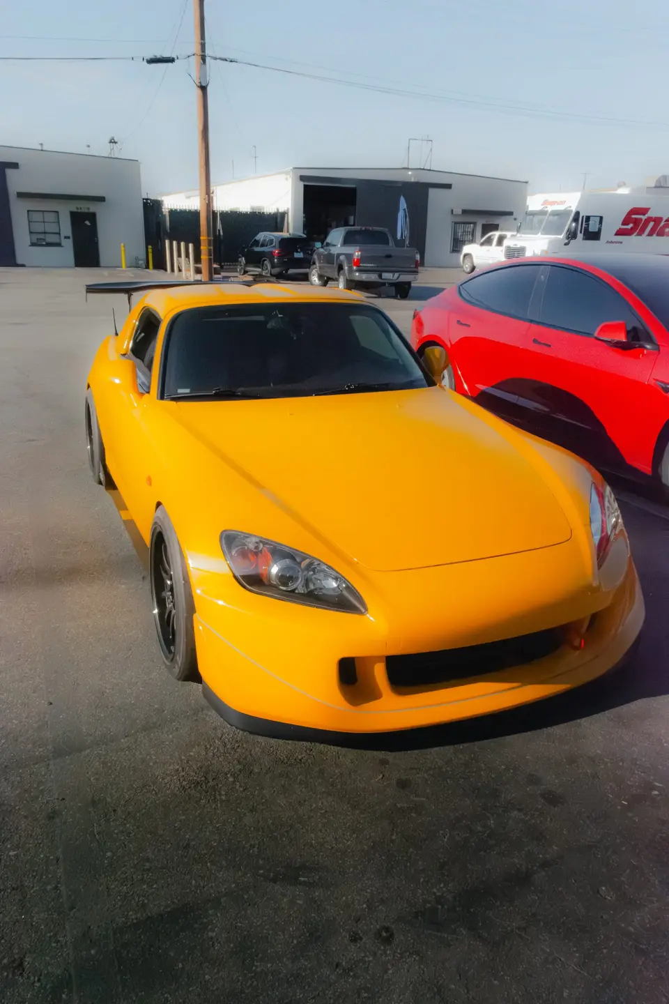 Yellow Honda S2000 paint correction and ceramic coating — studio photo 91