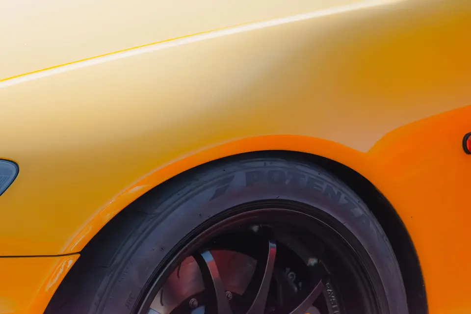 Yellow Honda S2000 paint correction and ceramic coating — studio photo 93