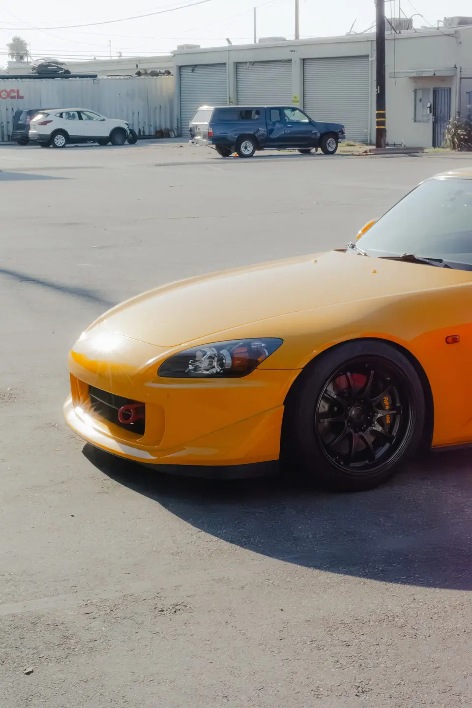 Yellow Honda S2000 paint correction and ceramic coating — studio photo 95