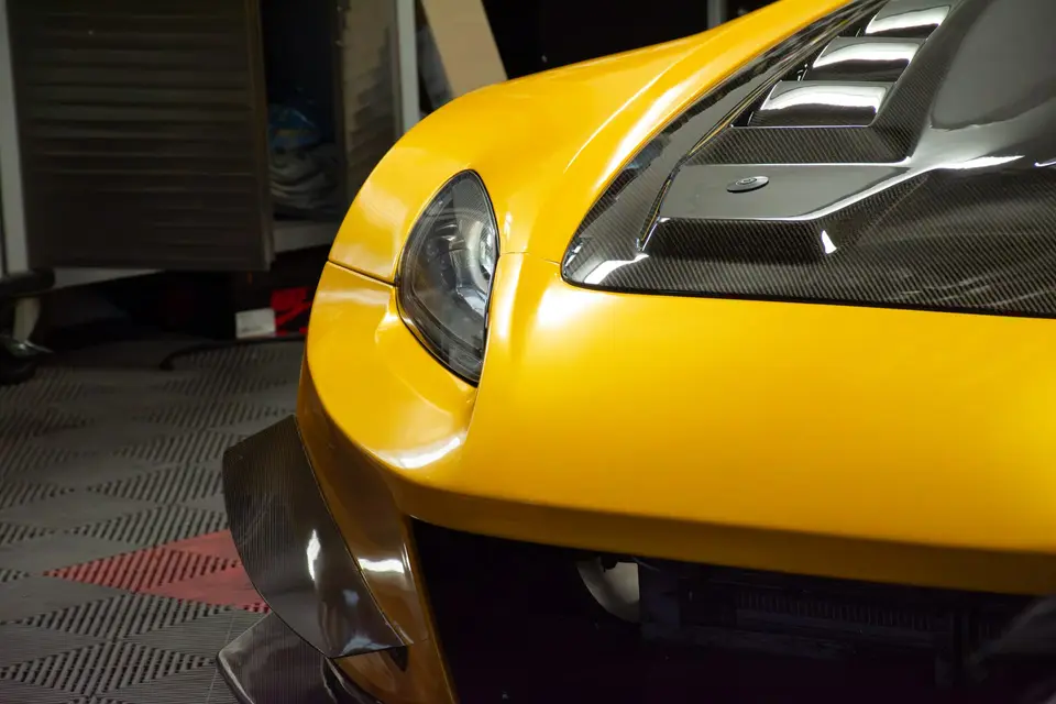 Yellow Honda S2000 paint correction and ceramic coating — studio photo 10