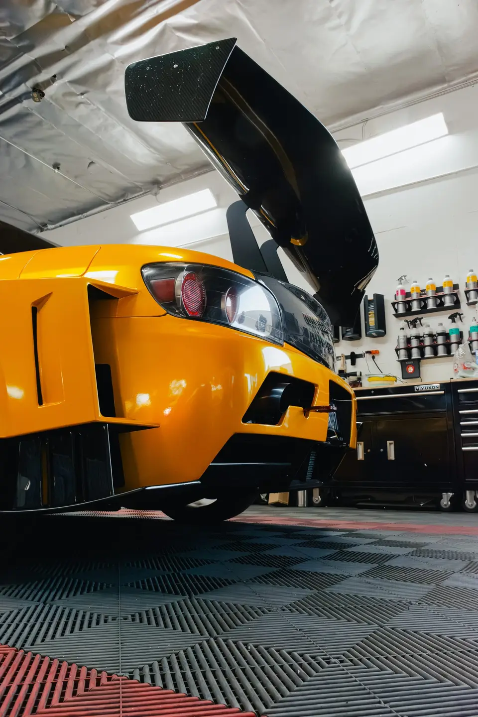 Yellow Honda S2000 paint correction and ceramic coating — studio photo 16