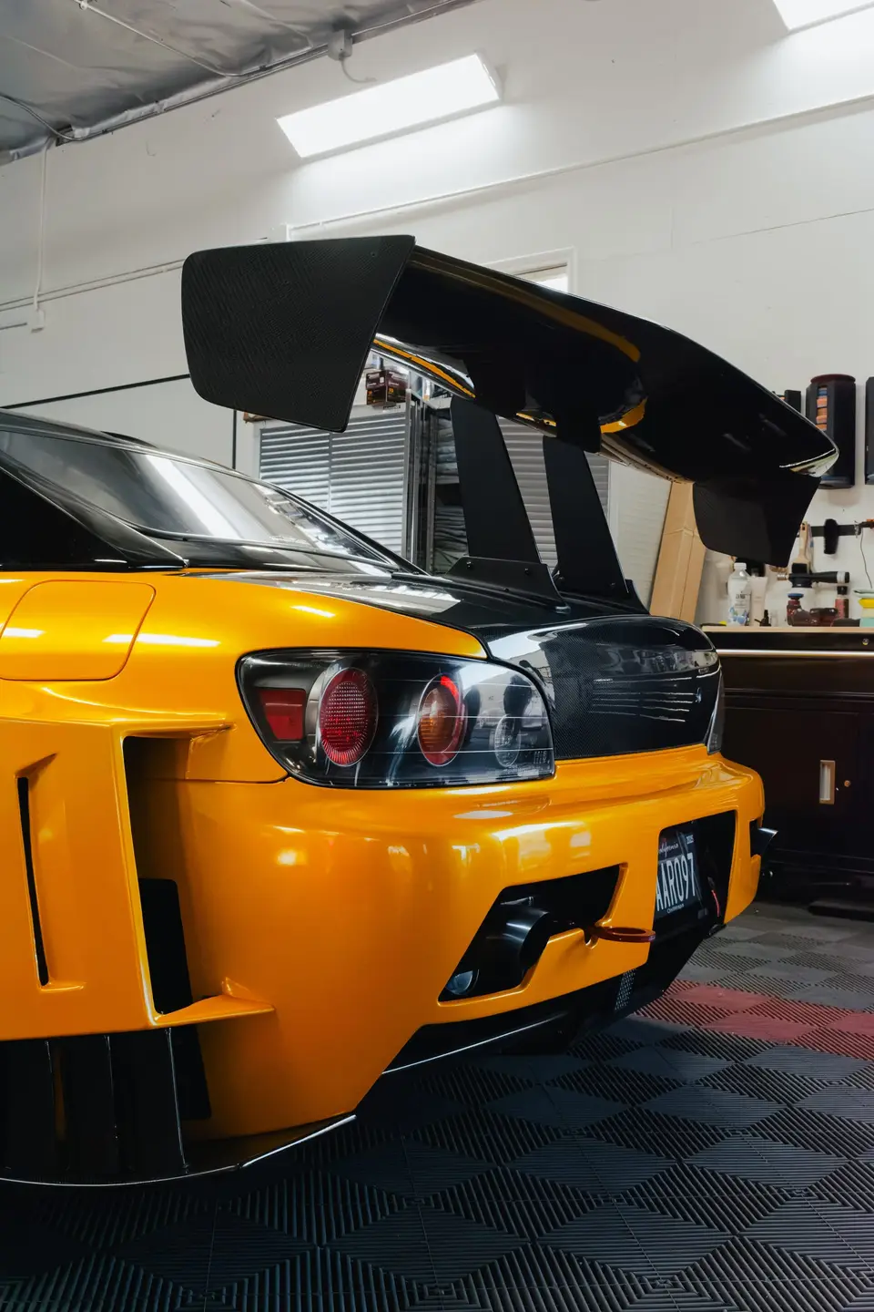 Yellow Honda S2000 paint correction and ceramic coating — studio photo 17