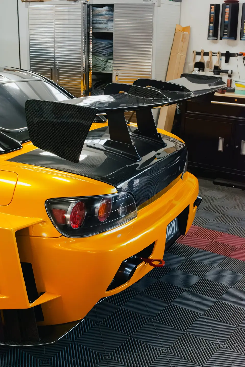 Yellow Honda S2000 paint correction and ceramic coating — studio photo 18