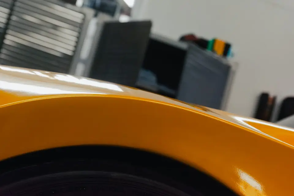 Yellow Honda S2000 paint correction and ceramic coating — studio photo 22