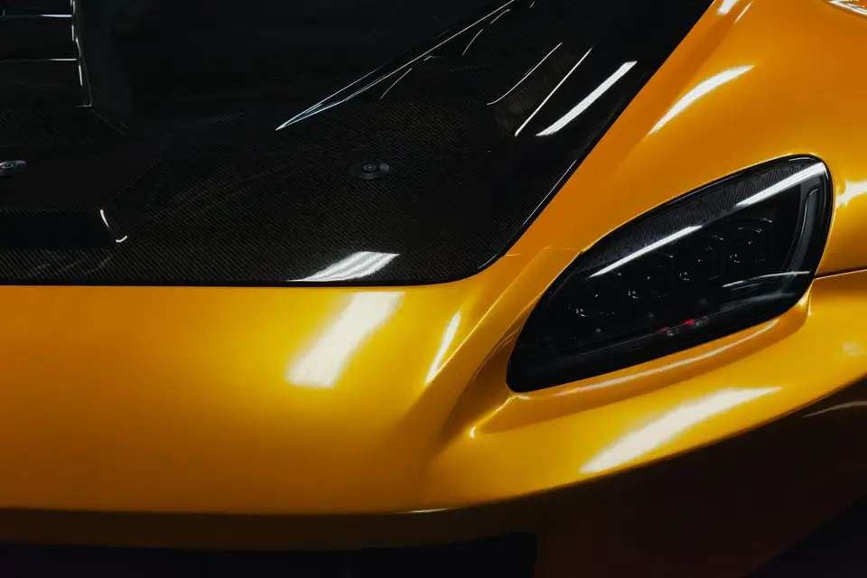 Yellow Honda S2000 paint correction and ceramic coating — studio photo 25