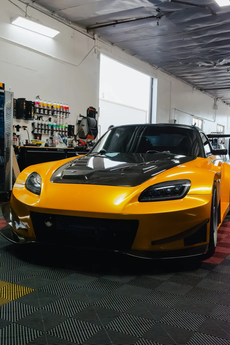 Yellow Honda S2000 paint correction and ceramic coating — studio photo 26