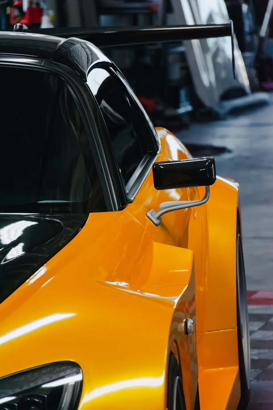 Yellow Honda S2000 paint correction and ceramic coating — studio photo 27