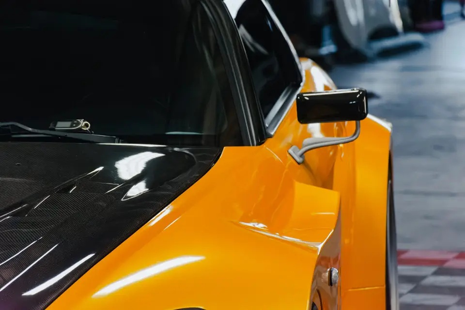 Yellow Honda S2000 paint correction and ceramic coating — studio photo 28
