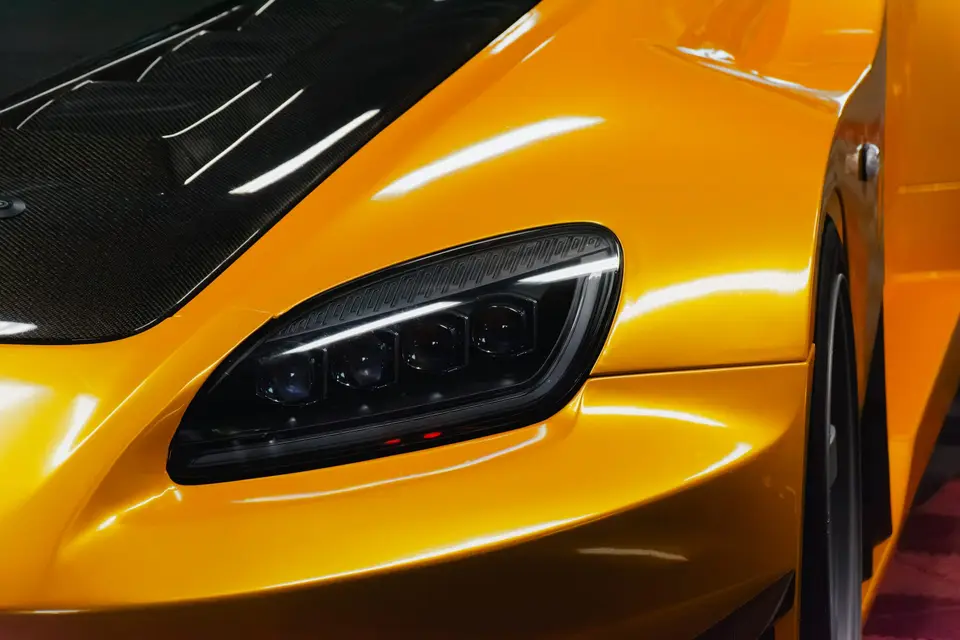 Yellow Honda S2000 paint correction and ceramic coating — studio photo 29