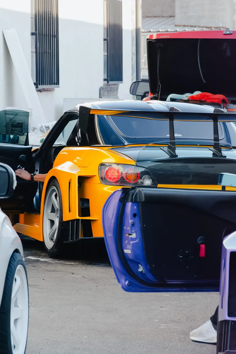 Yellow Honda S2000 paint correction and ceramic coating — studio photo 31