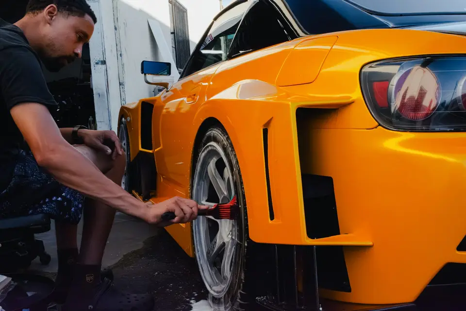 Yellow Honda S2000 paint correction and ceramic coating — studio photo 33