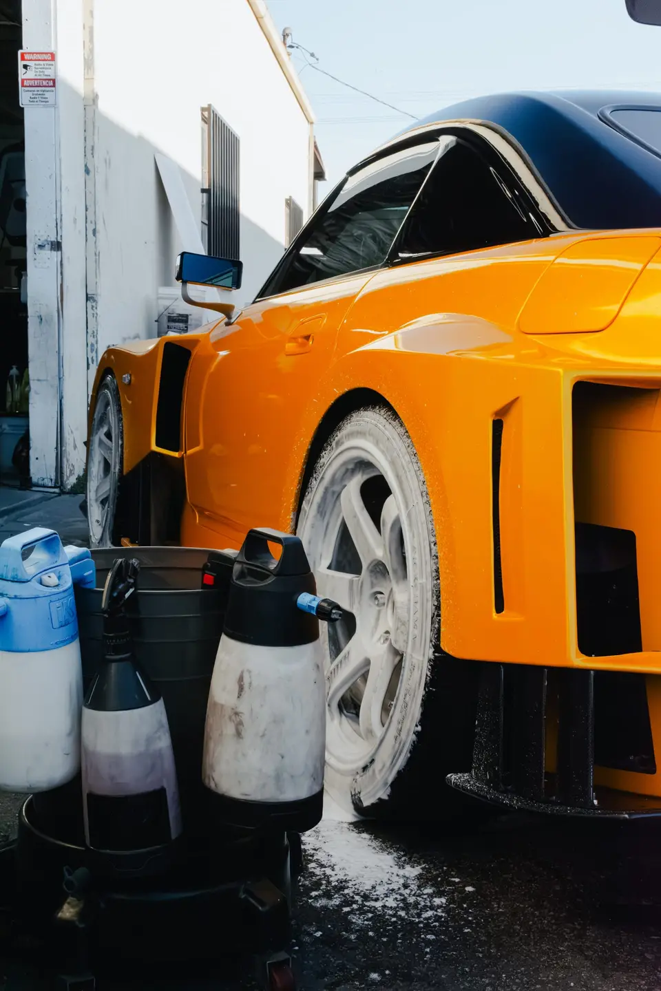 Yellow Honda S2000 paint correction and ceramic coating — studio photo 34