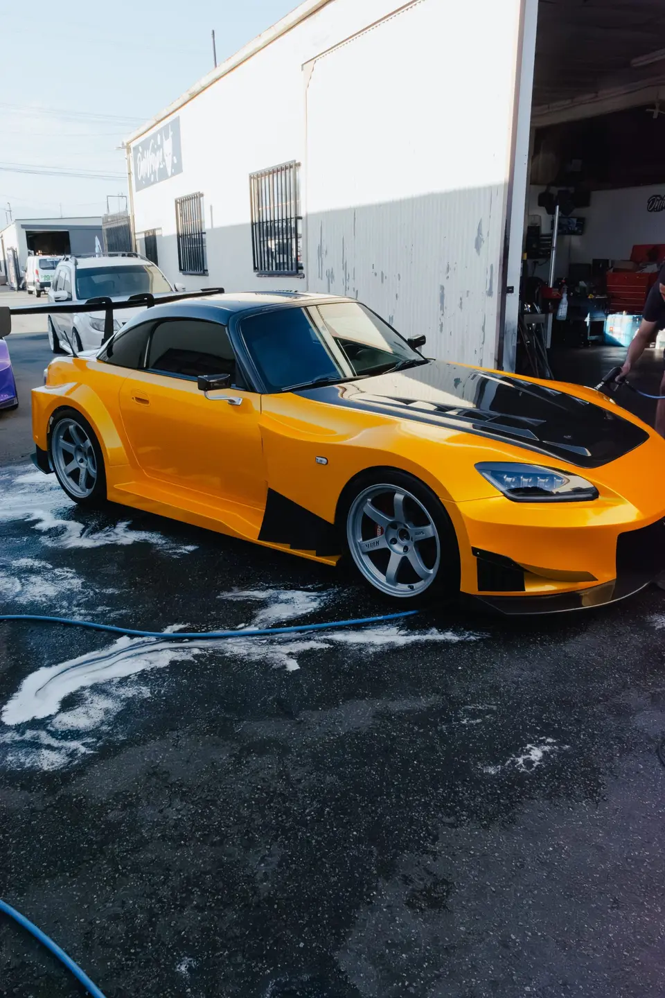 Yellow Honda S2000 paint correction and ceramic coating — studio photo 35
