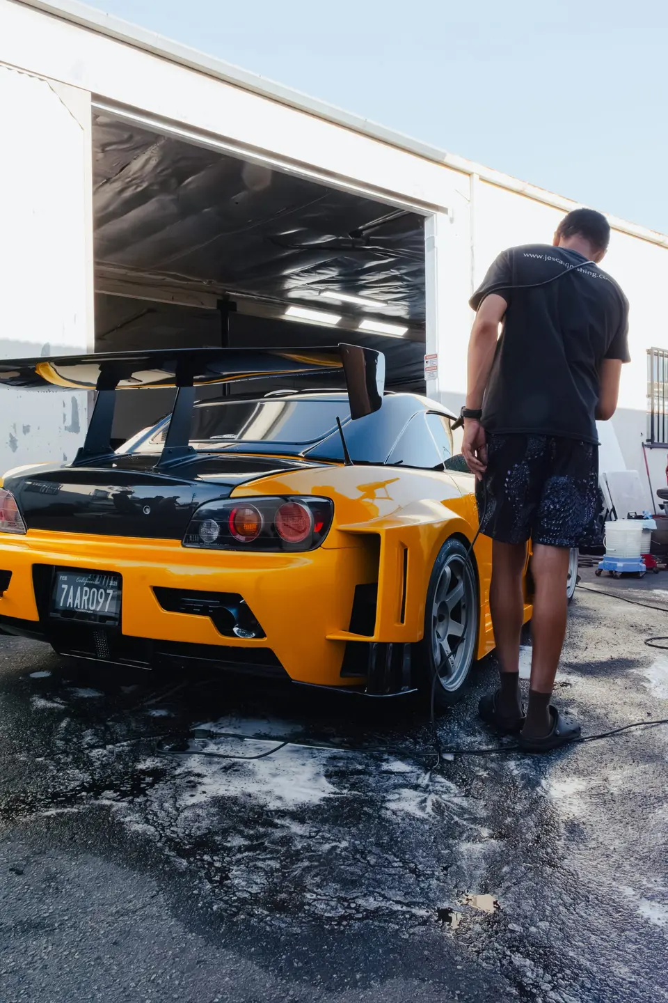 Yellow Honda S2000 paint correction and ceramic coating — studio photo 41