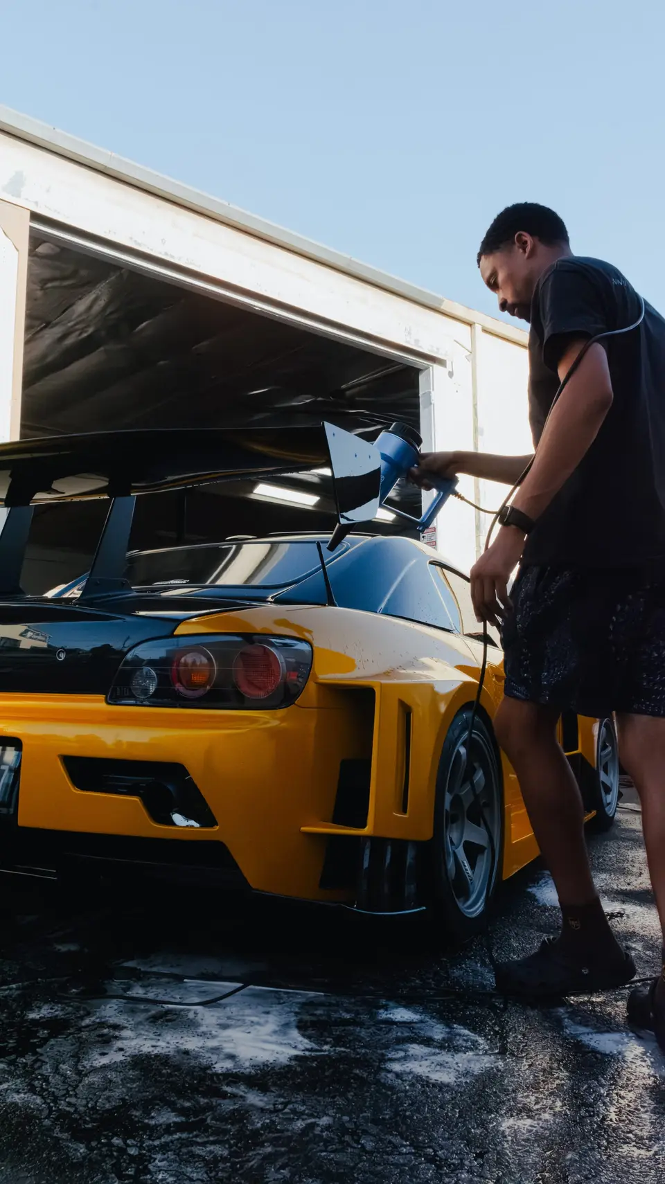 Yellow Honda S2000 paint correction and ceramic coating — studio photo 42