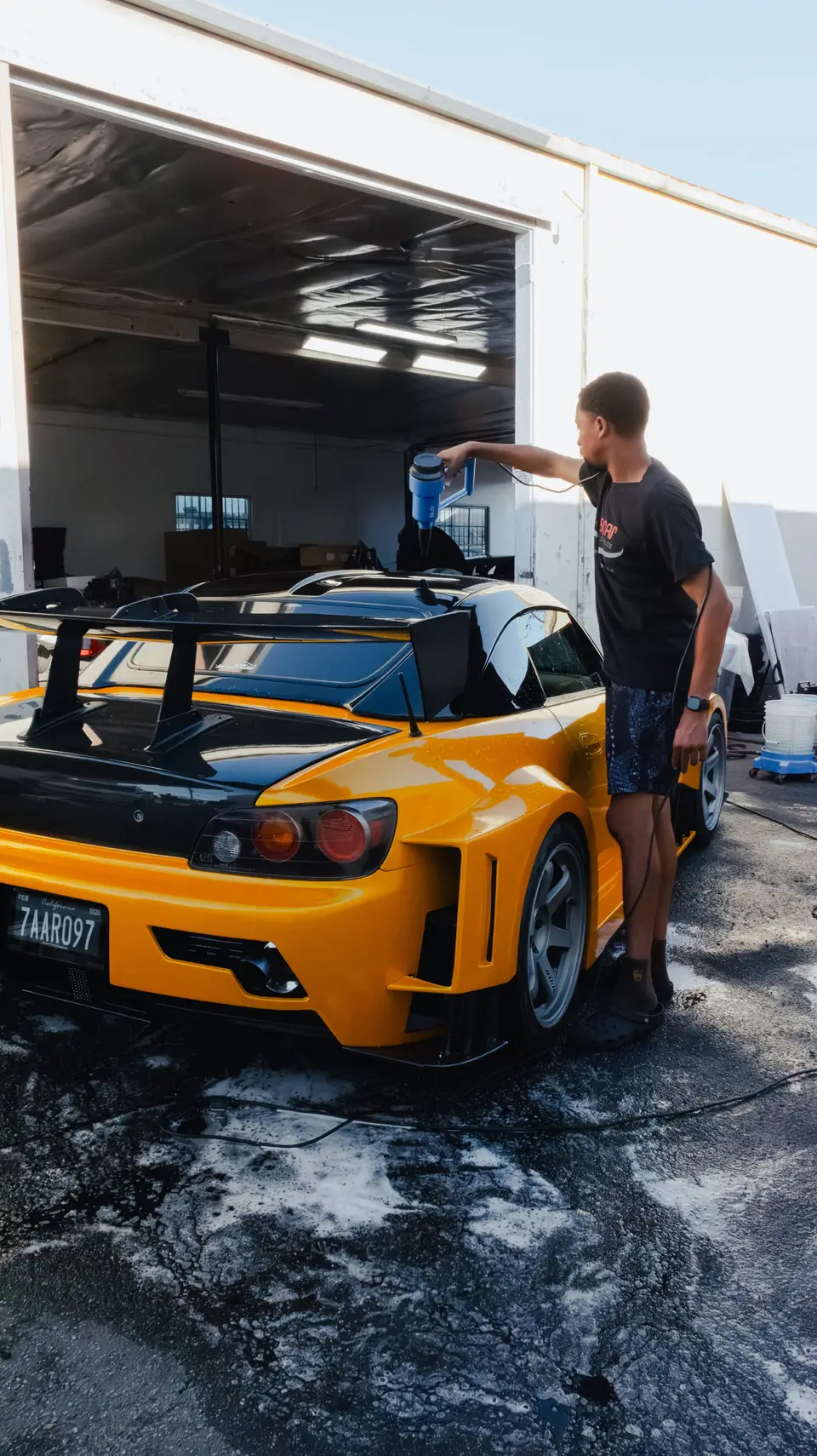 Yellow Honda S2000 paint correction and ceramic coating — studio photo 43