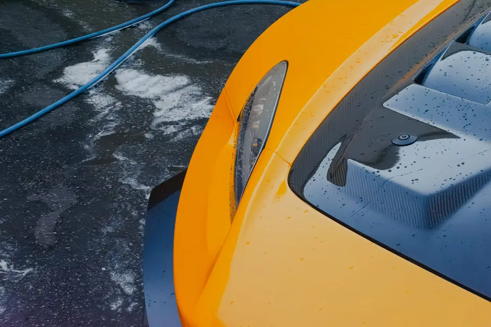 Yellow Honda S2000 paint correction and ceramic coating — studio photo 49