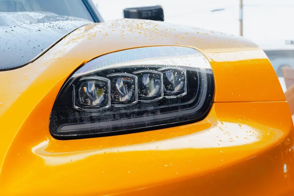 Yellow Honda S2000 paint correction and ceramic coating — studio photo 55