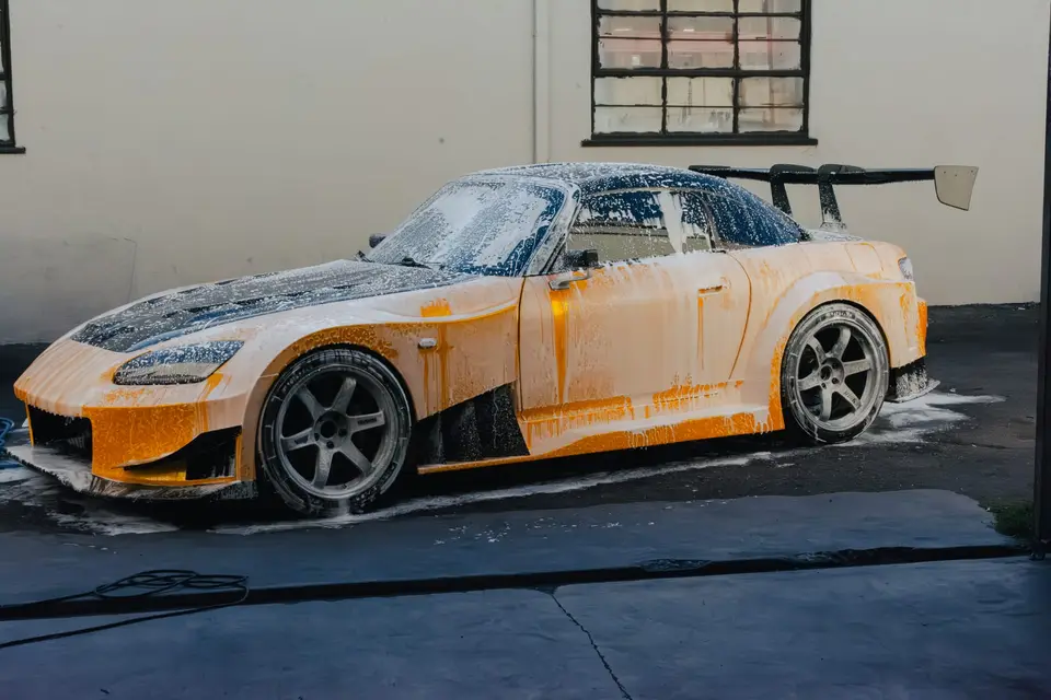Yellow Honda S2000 paint correction and ceramic coating — studio photo 62