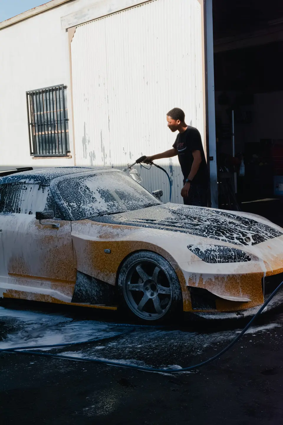 Yellow Honda S2000 paint correction and ceramic coating — studio photo 63
