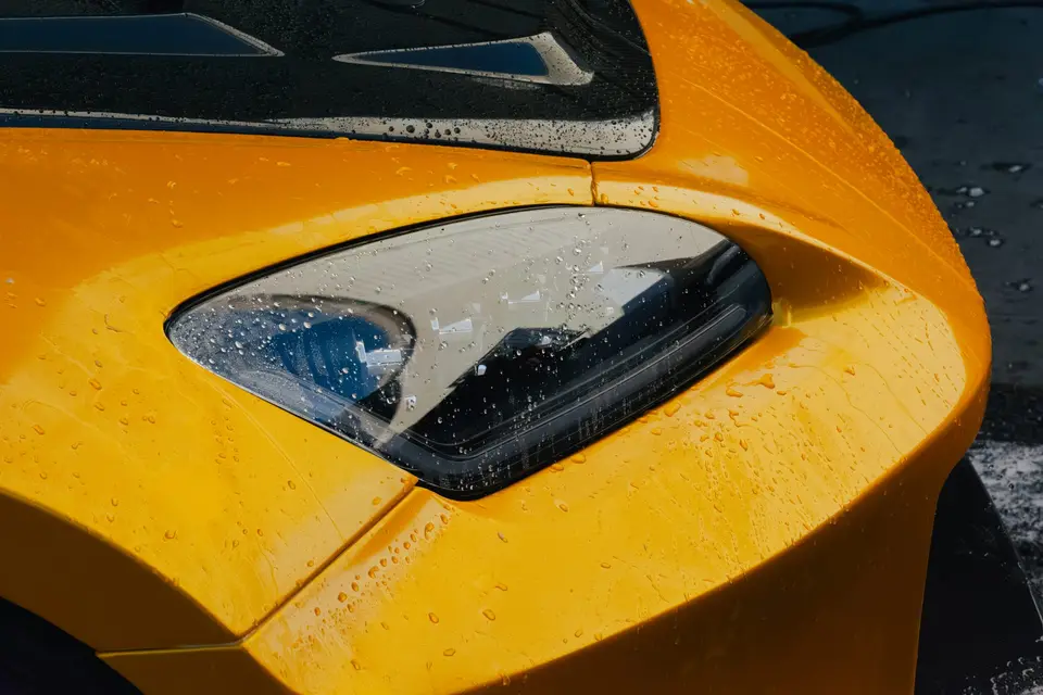 Yellow Honda S2000 paint correction and ceramic coating — studio photo 64
