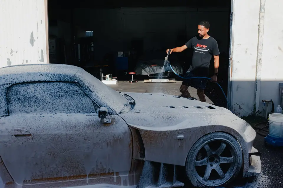 Yellow Honda S2000 paint correction and ceramic coating — studio photo 77