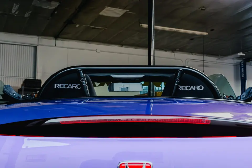 Purple Honda S2000 paint correction and ceramic coating — studio photo 34